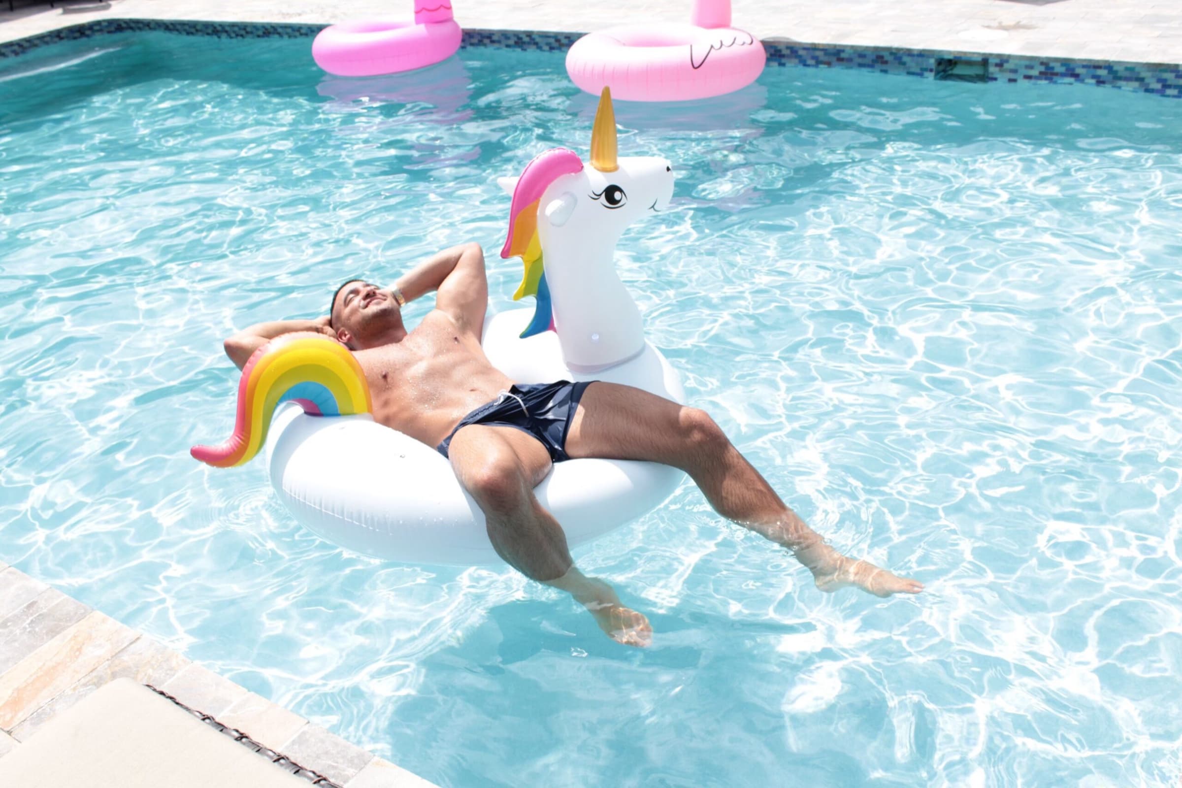 Guest relaxing poolside at Solstice at Wilton